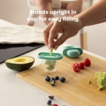 Frida Baby Push Pop Feeder, Baby Fruit Feeder, Baby Fruit Food Feeder to Safely Introduce New Foods, Fresh + Frozen Food Silicone Feeder for Babies, BPA Free, Dishwasher Safe - Image 3